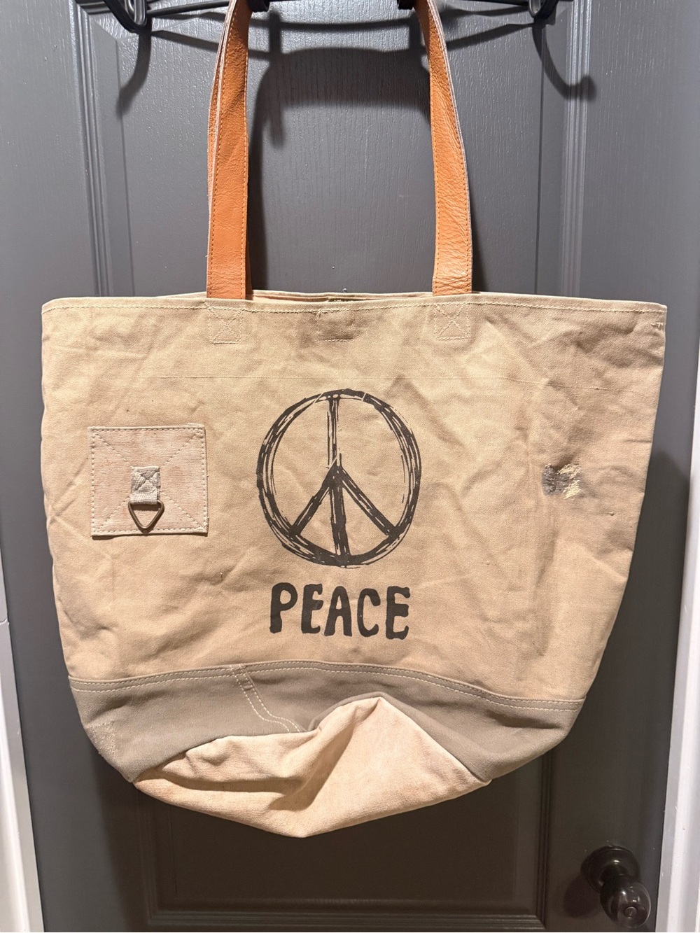 Tote with Peace Graphic and Leather Straps. Made from recycled military tents